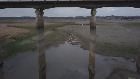 Fly under a modern bridge and flyover an ancient roman bridge Stock-Footage 104932928