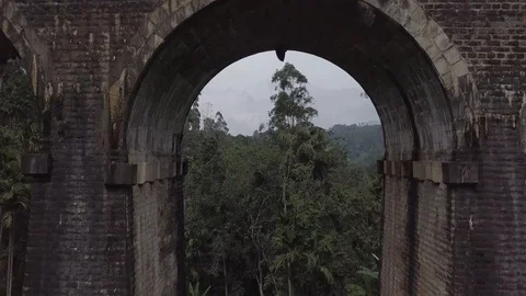 Fly Under Old Arched Bridge Stock Footage 86705658