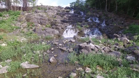 Fly up a waterfall to a lake Video stock 94552760