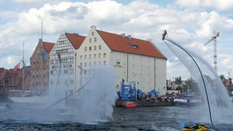 Flyboard acrobatics show, dynamic tricks, superman Stock-Footage 93687070