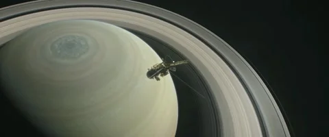 Flyby of Cassini Probe to Saturn. Elements of this video furnished by NASA Stock Footage 224012991