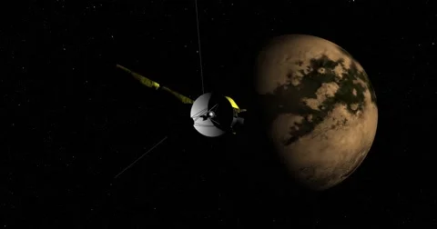 Flyby of Cassini spacecraft on its final approach toward Titan Stock Footage 57879880