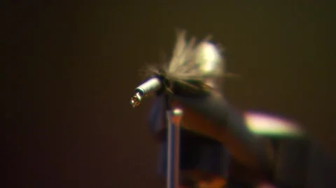 Flyfisher adjusting bait Stock Footage 55334924