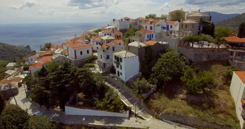 Flying above Alonissos' (greek island) old town Stock Footage