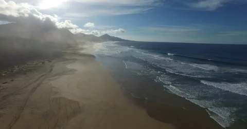 Flying above a beach in Spain. Video stock 60610687