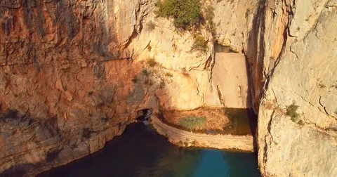 Flying above the beautiful deep blue lagoon , canyon  Stock Footage 85268244