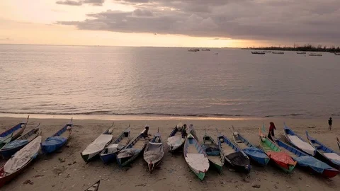 Flying above boats while sunset Stock Footage 113841041