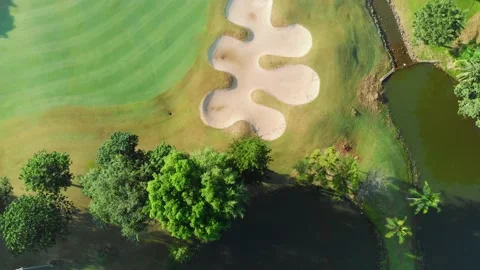 Flying above a bunker at the golf course Stock Footage 131384731