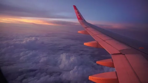 Flying above Cloud at Sunset in a Plane Stock Footage 291614031