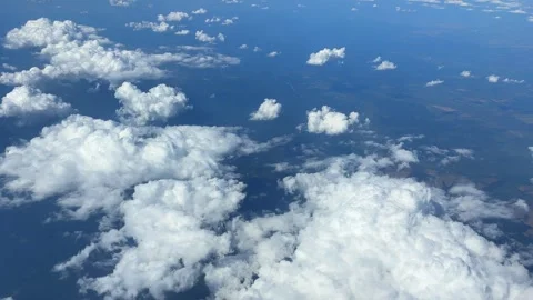 Flying above the clouds. Aerial view of the sky. Traveling by aircraft perfect Stock Footage 346691448