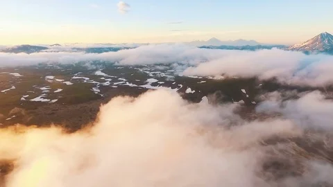 Flying above the clouds. Beautiful scenery of the mountains Stock Footage 72686394