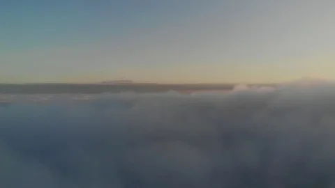 Flying above the clouds during sunset or sunrise 스톡 동영상 128709437