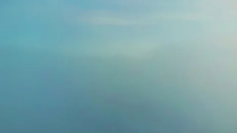 Flying above the clouds during sunset or sunrise Stock Footage 129099130