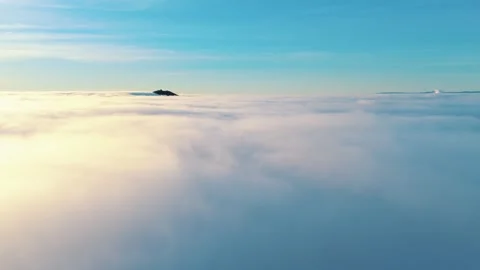 Flying above the clouds - endless sea of fog Video stock 319980691