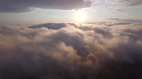Flying above the clouds in the evening Stock Footage 63474781