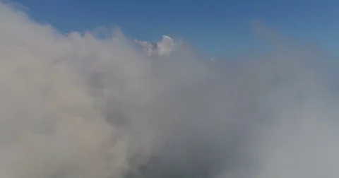 Flying above the clouds Stock Footage 77642668
