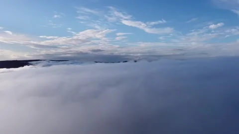 Flying above clouds Stockbeeldmateriaal 275295685