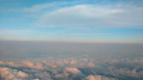 Flying above clouds. skyline with horizon line Stockbeeldmateriaal 95890543