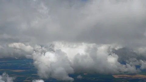 Flying above the clouds. Skyscape with cloud from the plane window midair Stock Footage 126359625