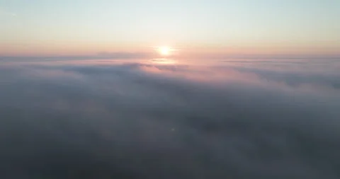 Flying above clouds at sunrise Stock-Footage 281980260