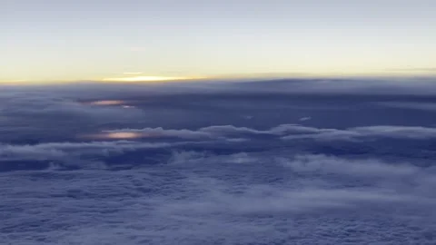 Flying above Clouds Sunset 4K HDR Stock Footage 250370367