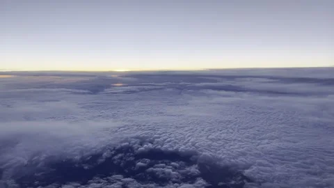 Flying above Clouds Sunset 4K HDR Stock Footage 250370373