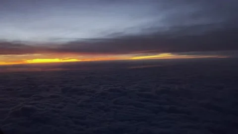 Flying above Clouds Sunset 4K HDR Stock Footage 250370479