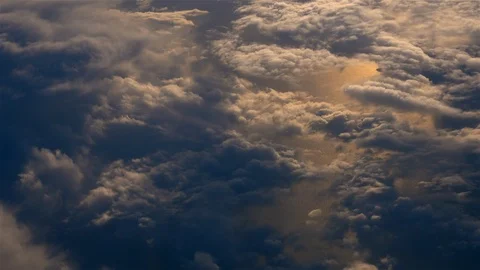 Flying above the clouds at sunset Video stock 98702608