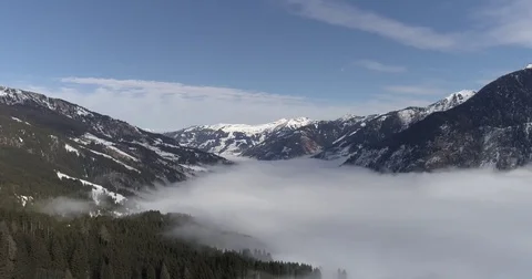 Flying above the clouds in the valley Stock Footage 72190121