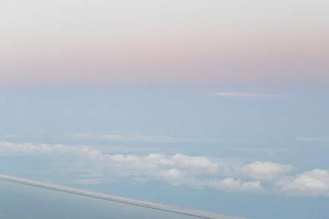 Flying above the clouds. view from the airplane, soft focus Stock Photos