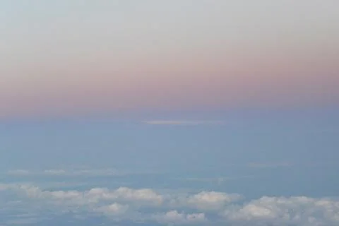 Flying above the clouds. view from the airplane, soft focus Stock Photos