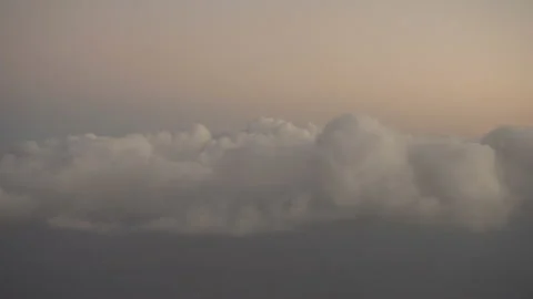 Flying above the clouds. View from the plane Stock Footage 98063264