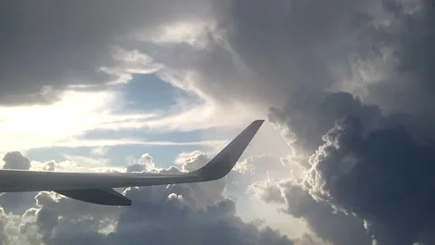 Flying Above Clouds View Through An Airplane Window Stock Footage 162659783