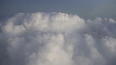 Flying above the clouds. Views from the plane. Stock Footage 98848200