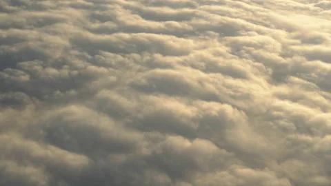 Flying above the clouds. Views from the plane. Stock Footage 98848639