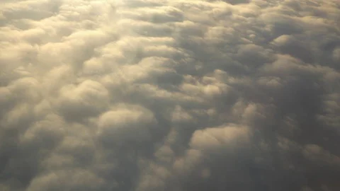 Flying above the clouds. Views from the plane. Stock Footage 98848986