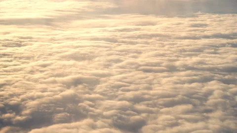 Flying above the clouds. Views from the plane. Stock Footage 98849940