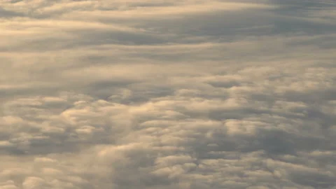 Flying above the clouds. Views from the plane. Stock Footage 98850403