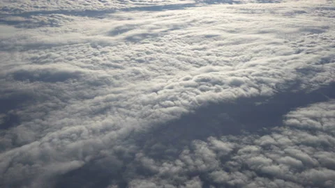 Flying above the clouds. Views from the plane. Video stock 99835942