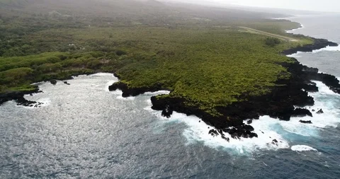 Flying above the coast over the ocean in hawaii 4k 60p Stock Footage 89892977
