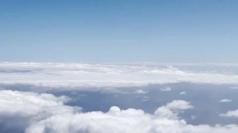 Flying above cumulus clouds on the Blue Pacific Ocean Stock-Footage 201489415