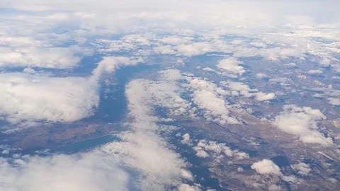 Flying above the curved lines of the clouds-1 Stock Footage 258569271