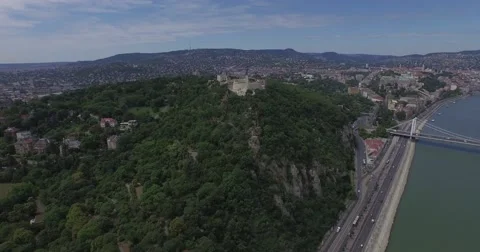 Flying above Danube river in Budapest city. Aerial footage of Citadel. 4K Stock Footage 54326854
