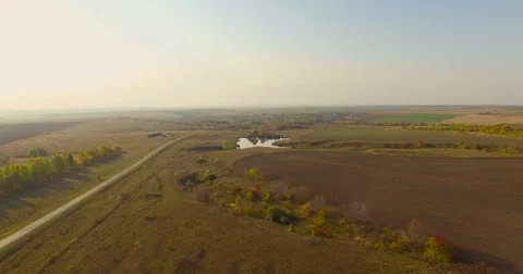 Flying above fields Stock Footage 56560933