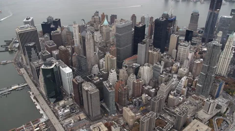 Flying above the Financial District toward the tip of Lower Manhattan. Shot in Stock Footage 59529218