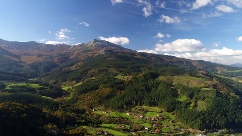 Flying above forest, mountains falls landscape Stock Footage 82377618