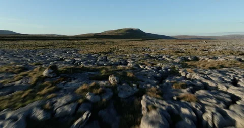 Flying above limestone pavement in Yorkshire Dales Stock Footage 312324901