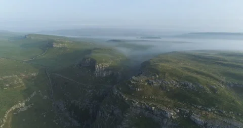 Flying above a limestone valley Stock Footage 166382681