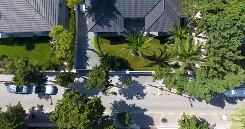 Flying above luxury complex beach front villas with perfect exotic location Stock Footage 91985838