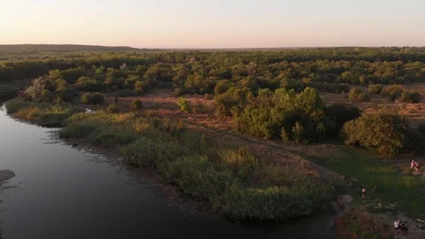 Flying above Milk river with forests and fields in Ukraine, Melitopol, Sosnovka Stock Footage 114220169